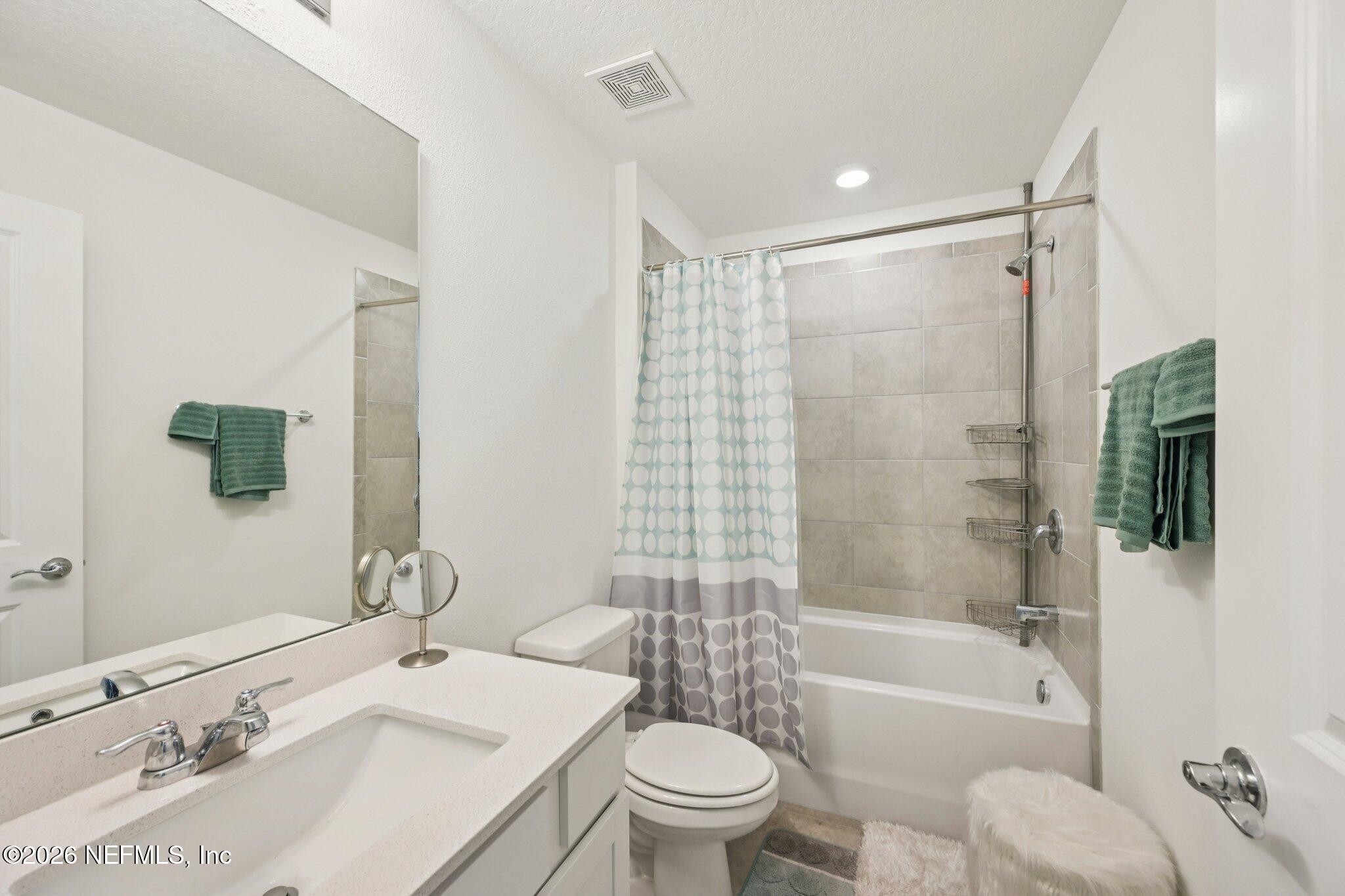 5508 Integrity Way Jacksonville, FL 32244 - Photo 8 of 34 a bathroom with a sink toilet bathtub and shower