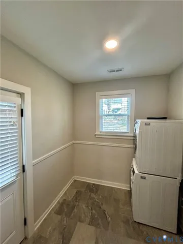 a view of a kitchen with a refrigerator a sink and dishwasher