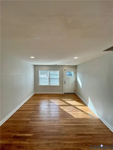 a view of an empty room and window