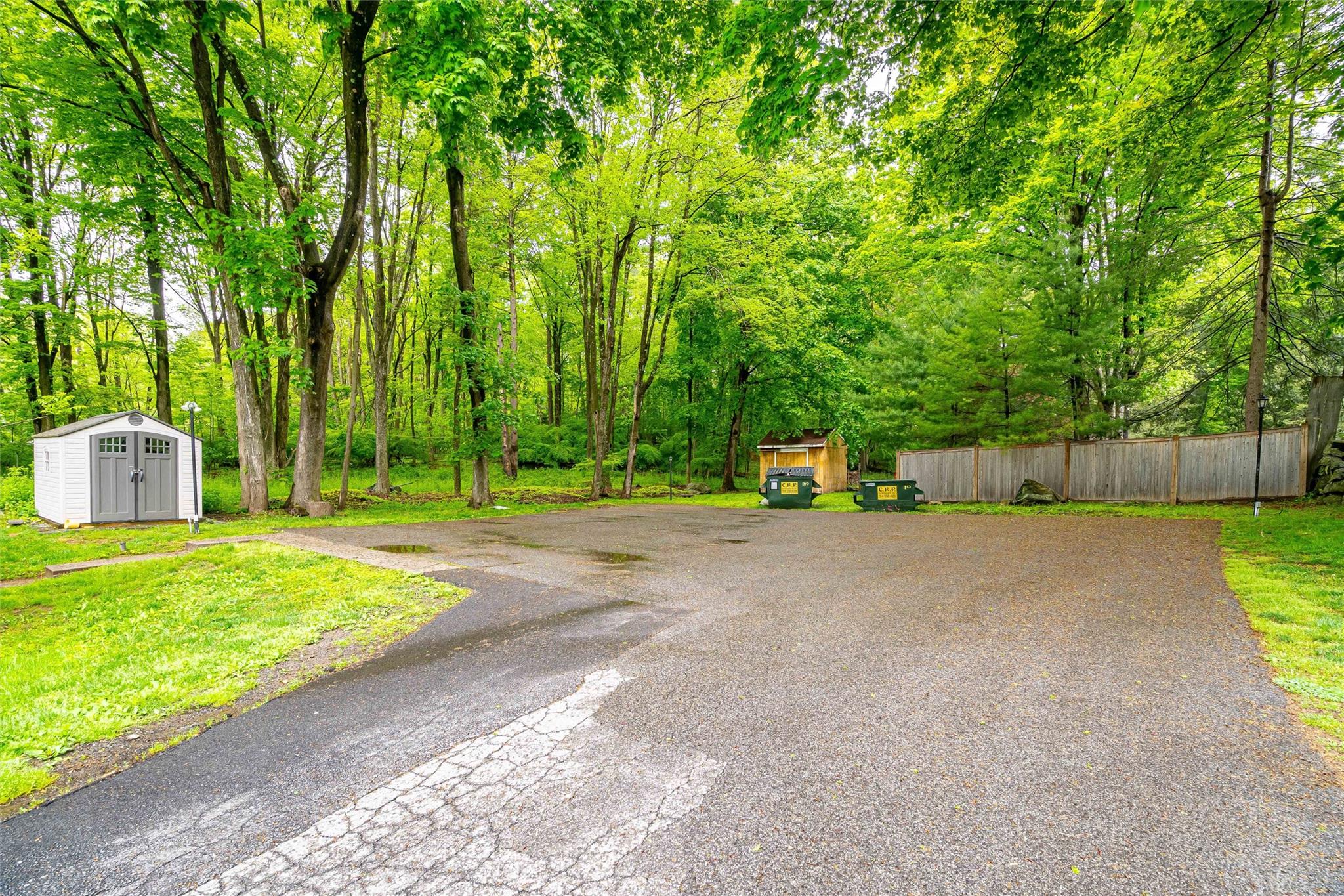 159 Highway 202 Somers, NY 10589 - Photo 15 of 48 a small garden covered with tall trees