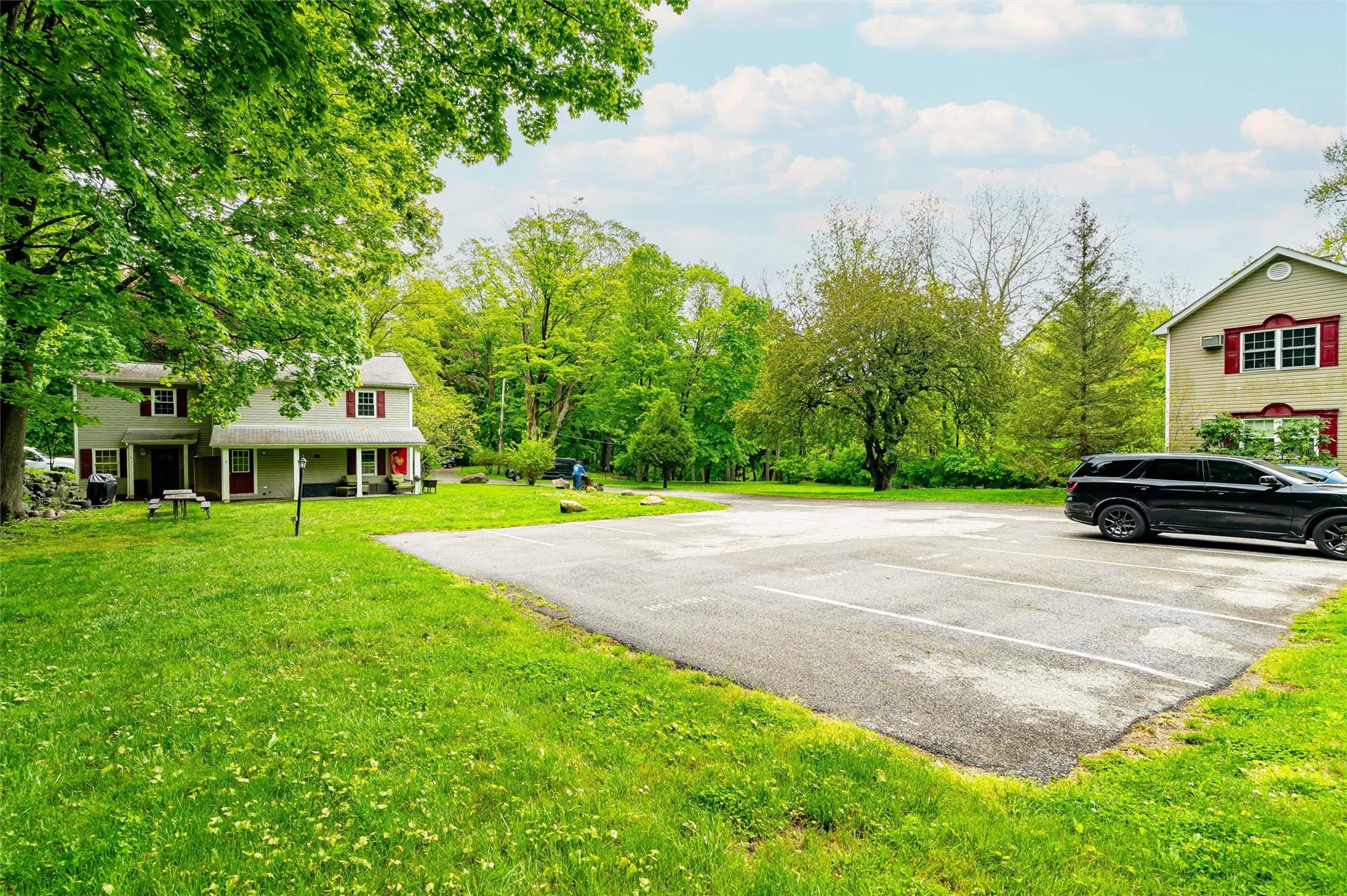 159 Highway 202 Somers, NY 10589 - Photo 27 of 48 a front view of a house with a yard