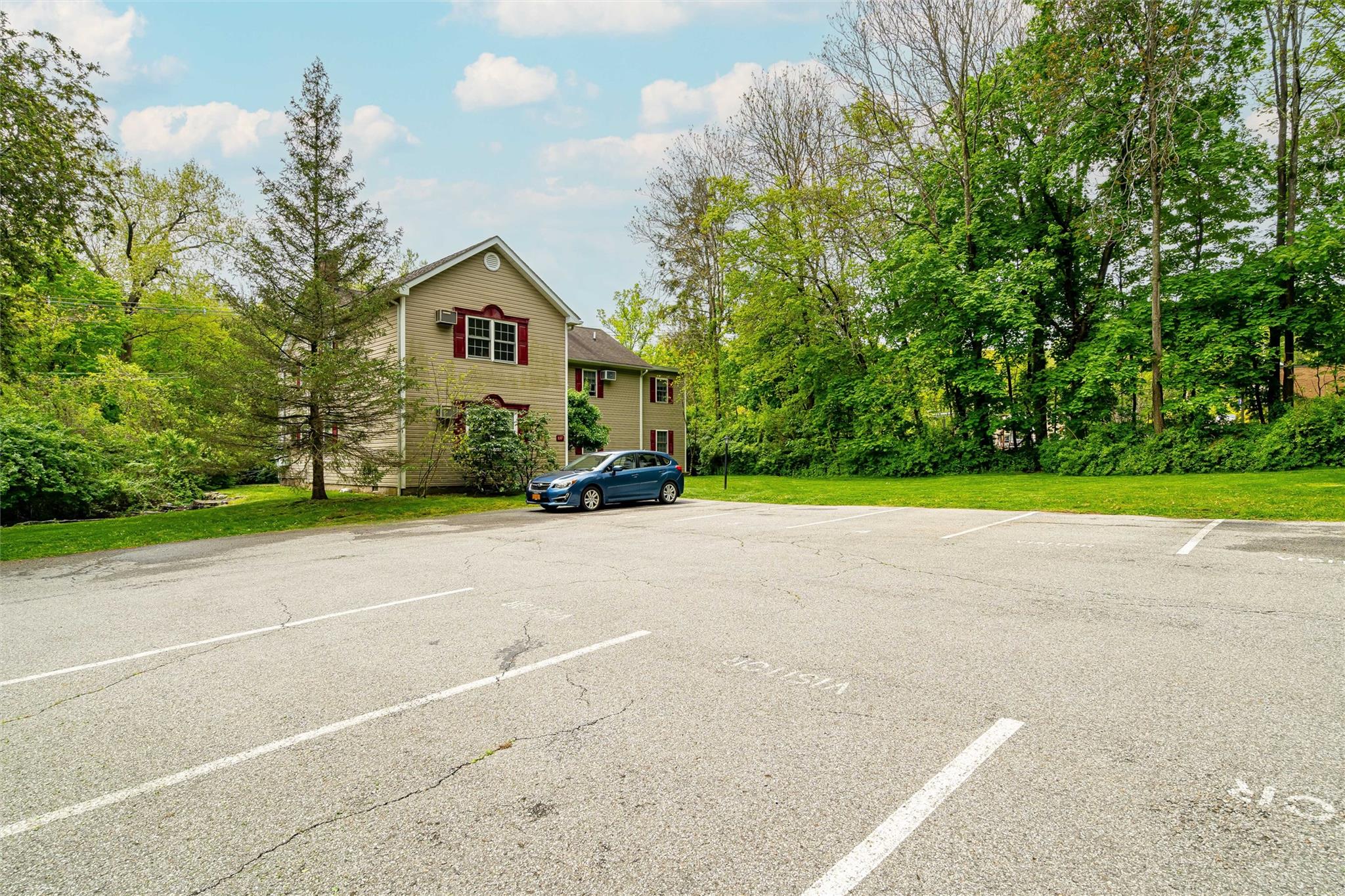 159 Highway 202 Somers, NY 10589 - Photo 28 of 48 a view of a house with a yard and large trees