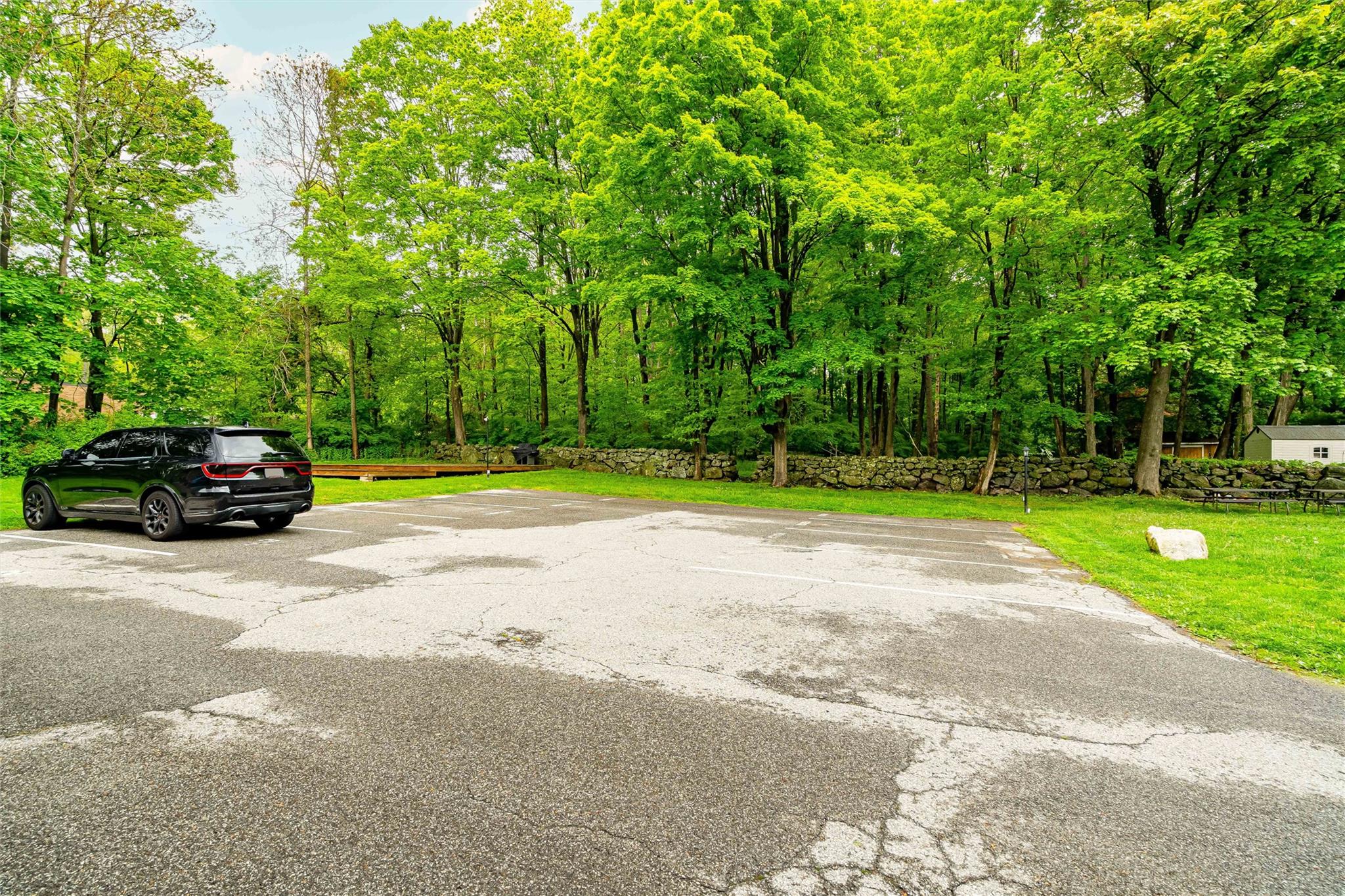 159 Highway 202 Somers, NY 10589 - Photo 32 of 48 a car parked on the side of the road