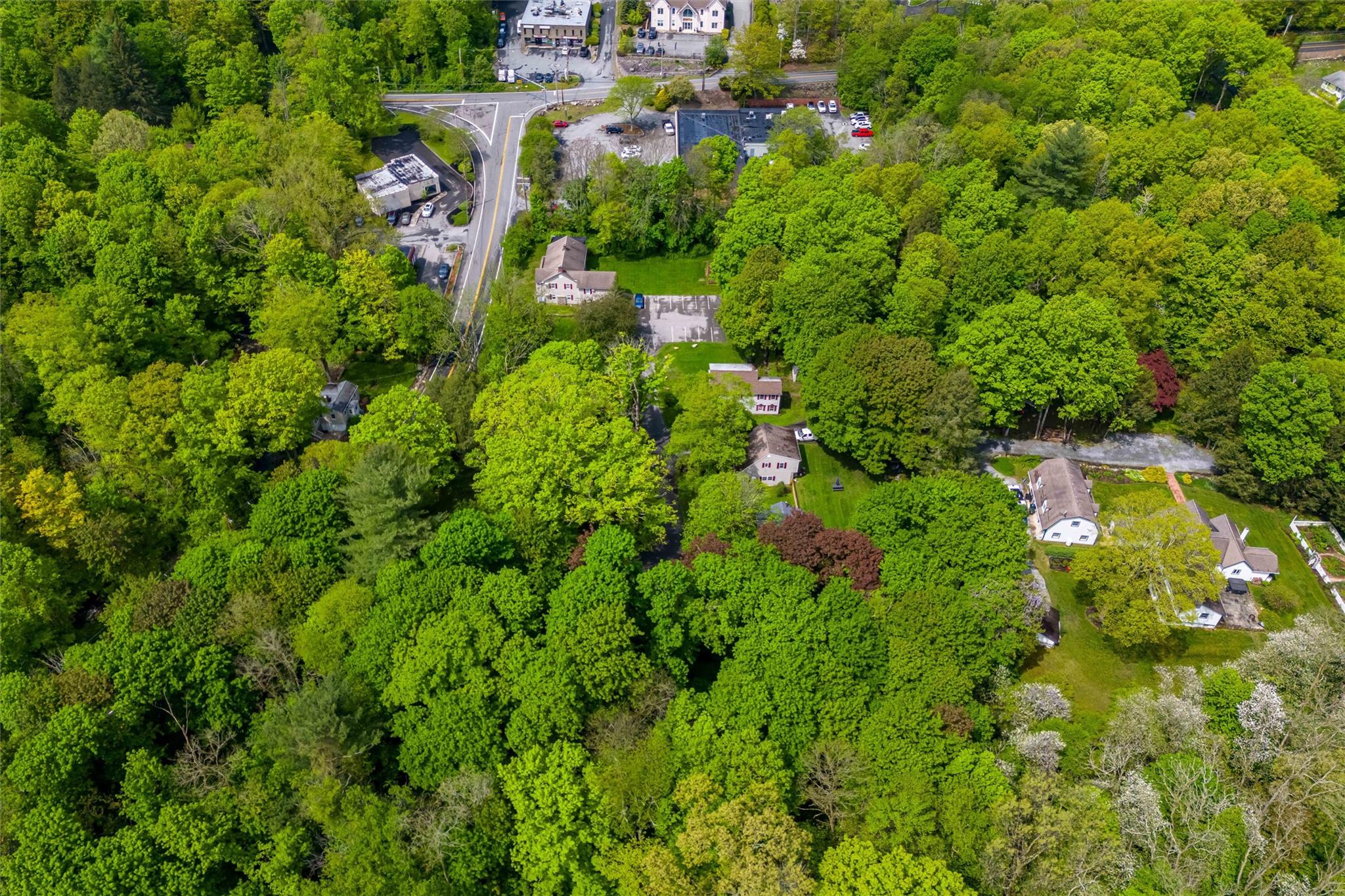 159 Highway 202 Somers, NY 10589 - Photo 41 of 48 an aerial view of residential houses with outdoor space and trees