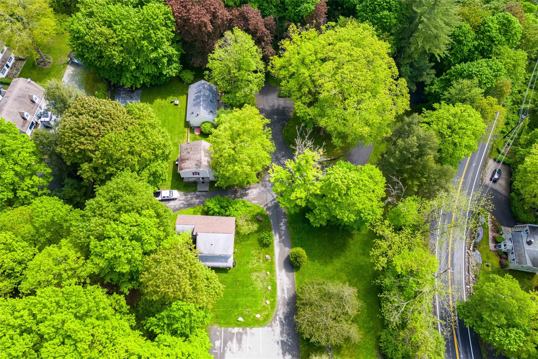159 Highway 202 Somers, NY 10589 - Photo 46 of 48 an aerial view of residential house with outdoor space and trees all around