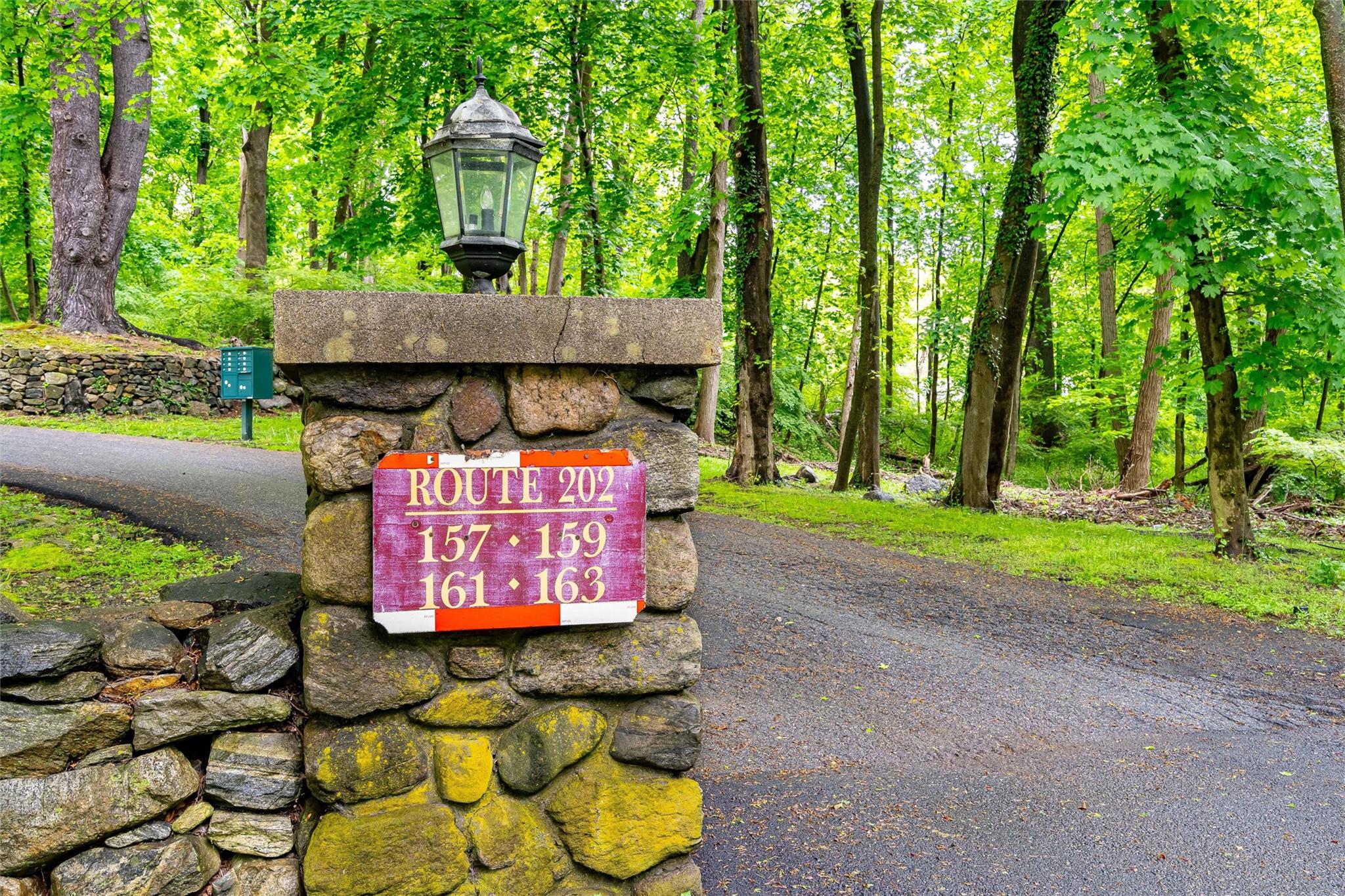 159 Highway 202 Somers, NY 10589 - Photo 5 of 48 a sign on the side of the road