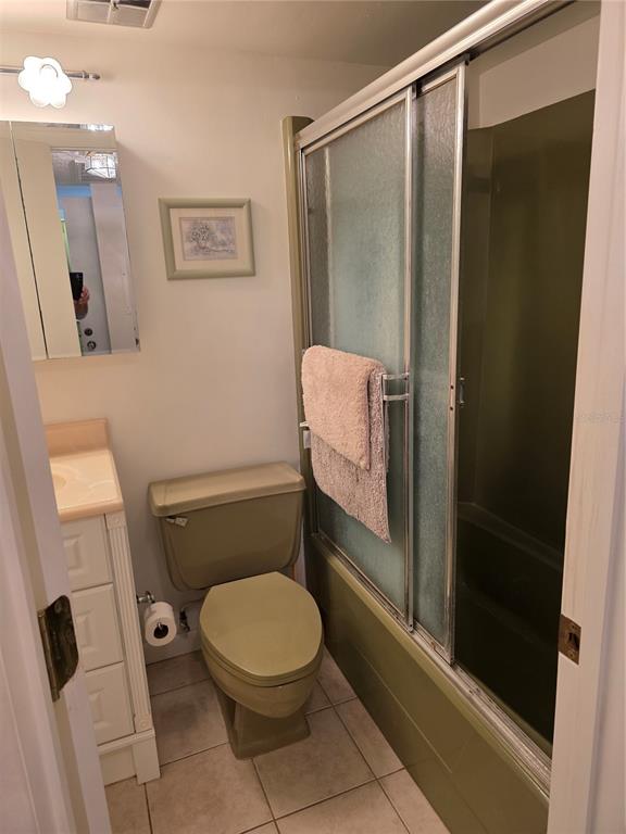 2207 Belleair Road, Unit B6 Clearwater, FL 33764 - Photo 15 of 21 a bathroom with a toilet and a shower