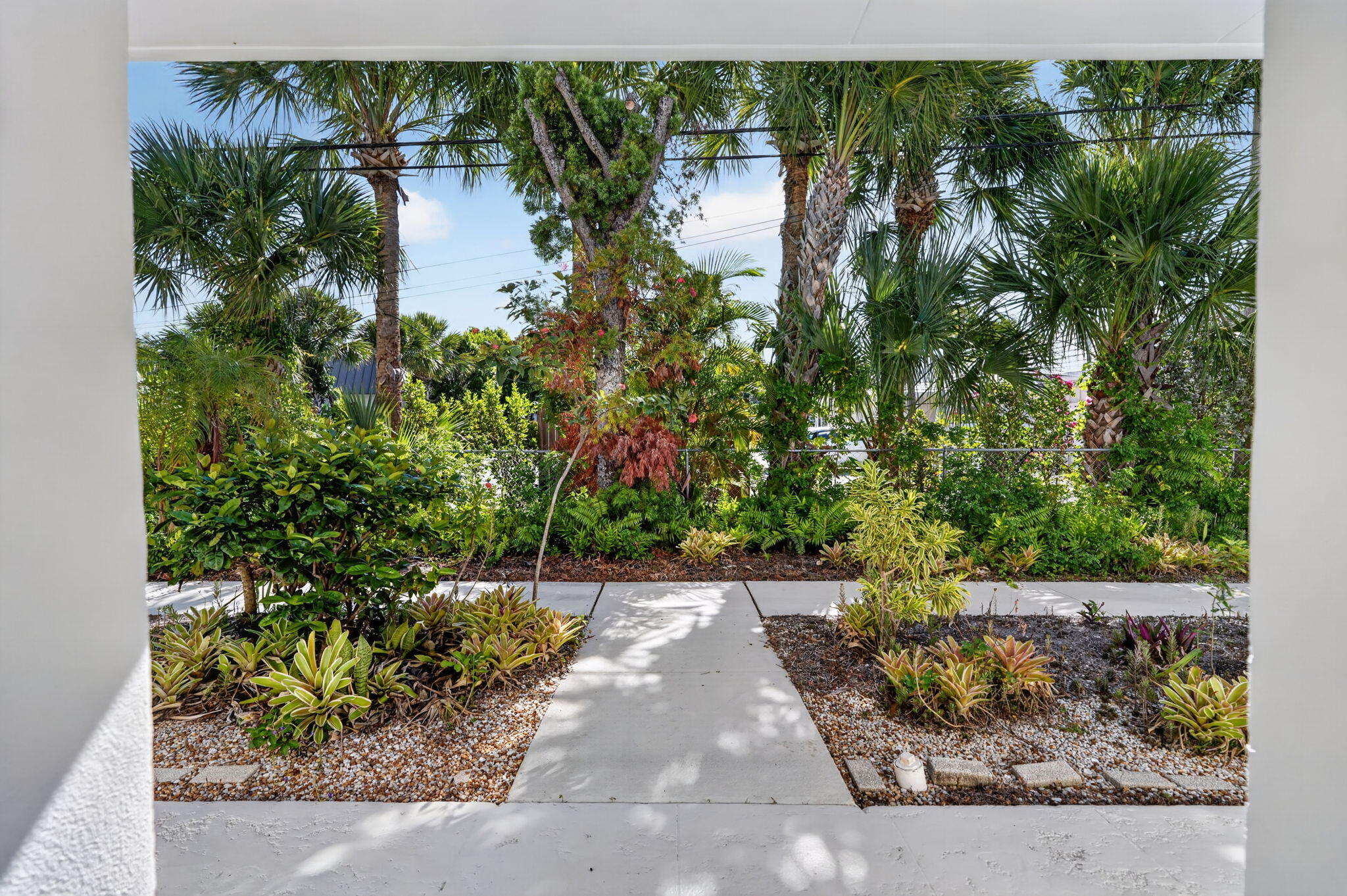91 Willow Road, Unit 104 Tequesta, FL 33469 - Photo 18 of 25 Entry Walkway