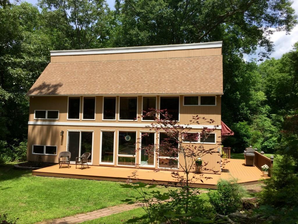 30 Brickyard Road Clinton, CT 06413 - Photo 1 of 1 front view of house with a yard