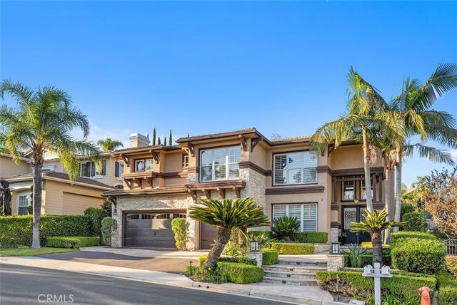 a view of multiple houses with a small yard