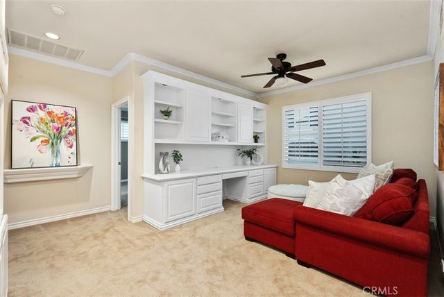 a bathroom with a granite countertop tub sink and mirror