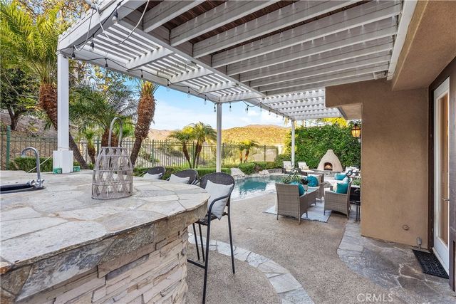 a view of a town with mountains in the background