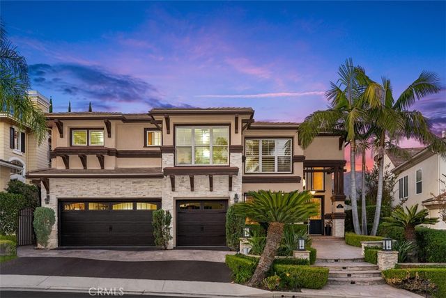 a view of a city with mountains in the background