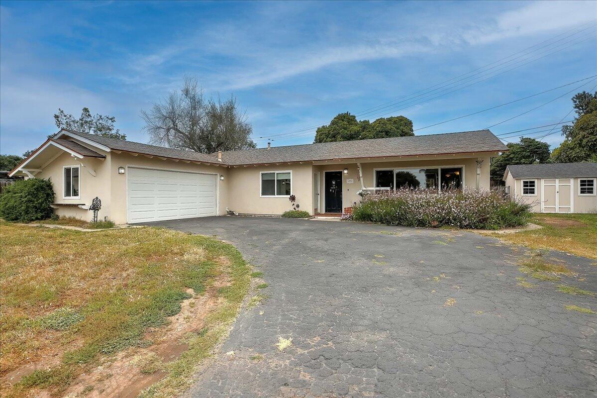 77 Newcastle Circle Goleta, CA 93117 - Photo 2 of 34 a front view of house with yard and trees around