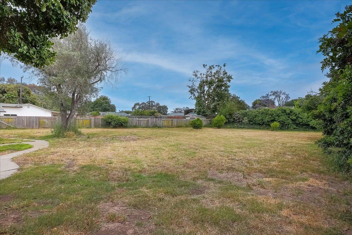 77 Newcastle Circle Goleta, CA 93117 - Photo 8 of 34 a view of a yard with an trees