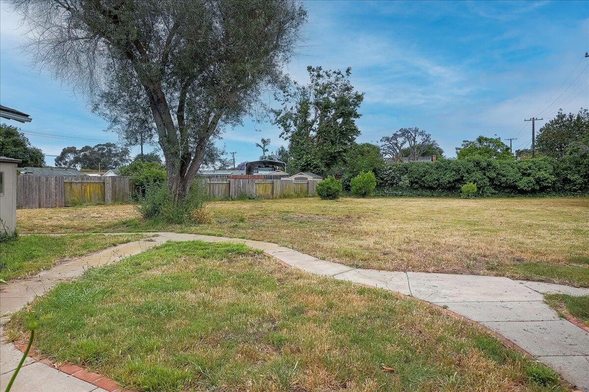 77 Newcastle Circle Goleta, CA 93117 - Photo 9 of 34 a view of a yard with a tree