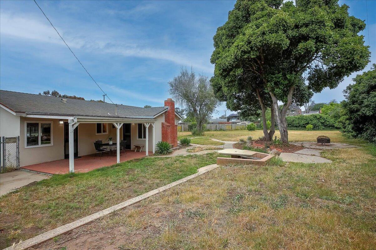 77 Newcastle Circle Goleta, CA 93117 - Photo 10 of 34 a view of a house with backyard and a tree