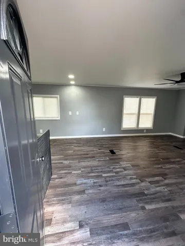 a view of room with window and stairs