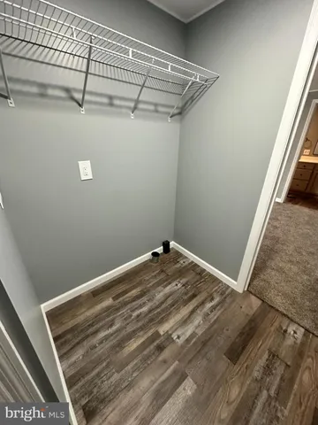 a view of a room with racks on the wall