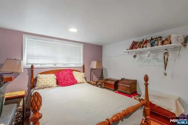 a view of a chair and table on the garden