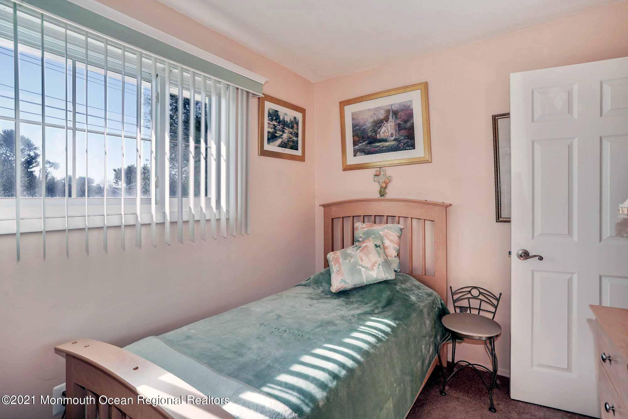451 Alfred Road Toms River, NJ 08757 - Photo 12 of 25 a bedroom with a bed and a window