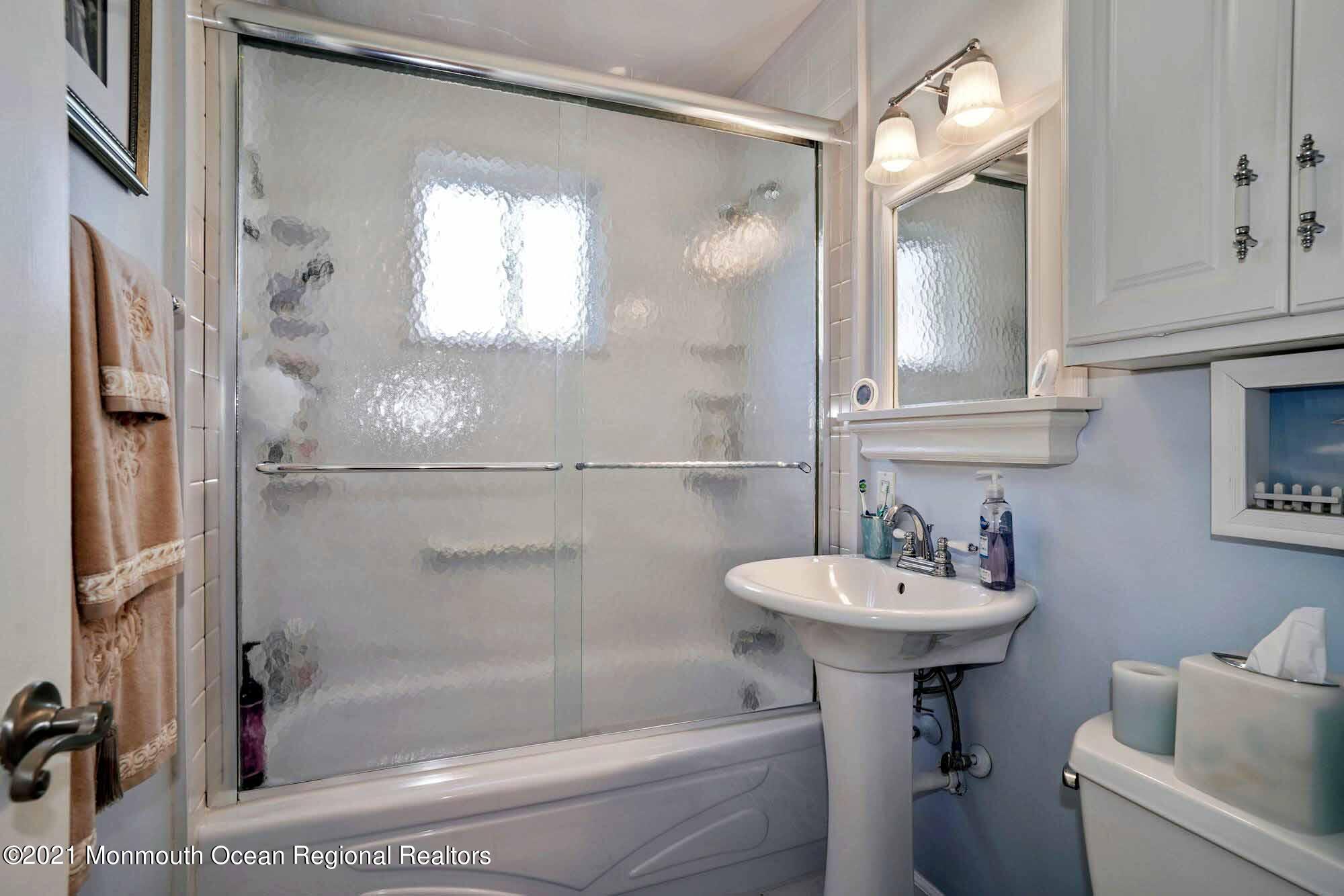 451 Alfred Road Toms River, NJ 08757 - Photo 13 of 25 a bathroom with a sink toilet and shower