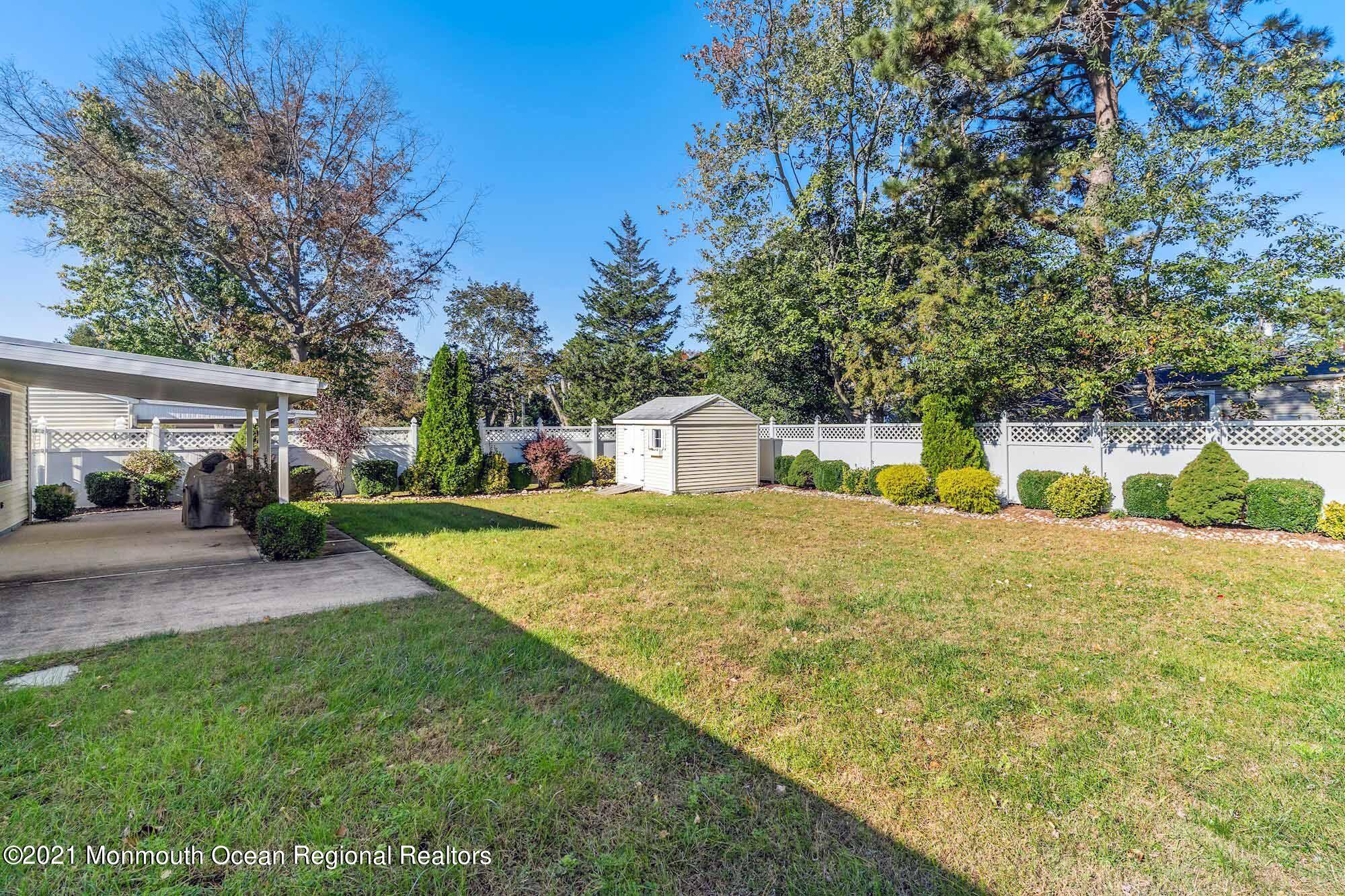 451 Alfred Road Toms River, NJ 08757 - Photo 23 of 25 a house view with swimming pool next to a yard