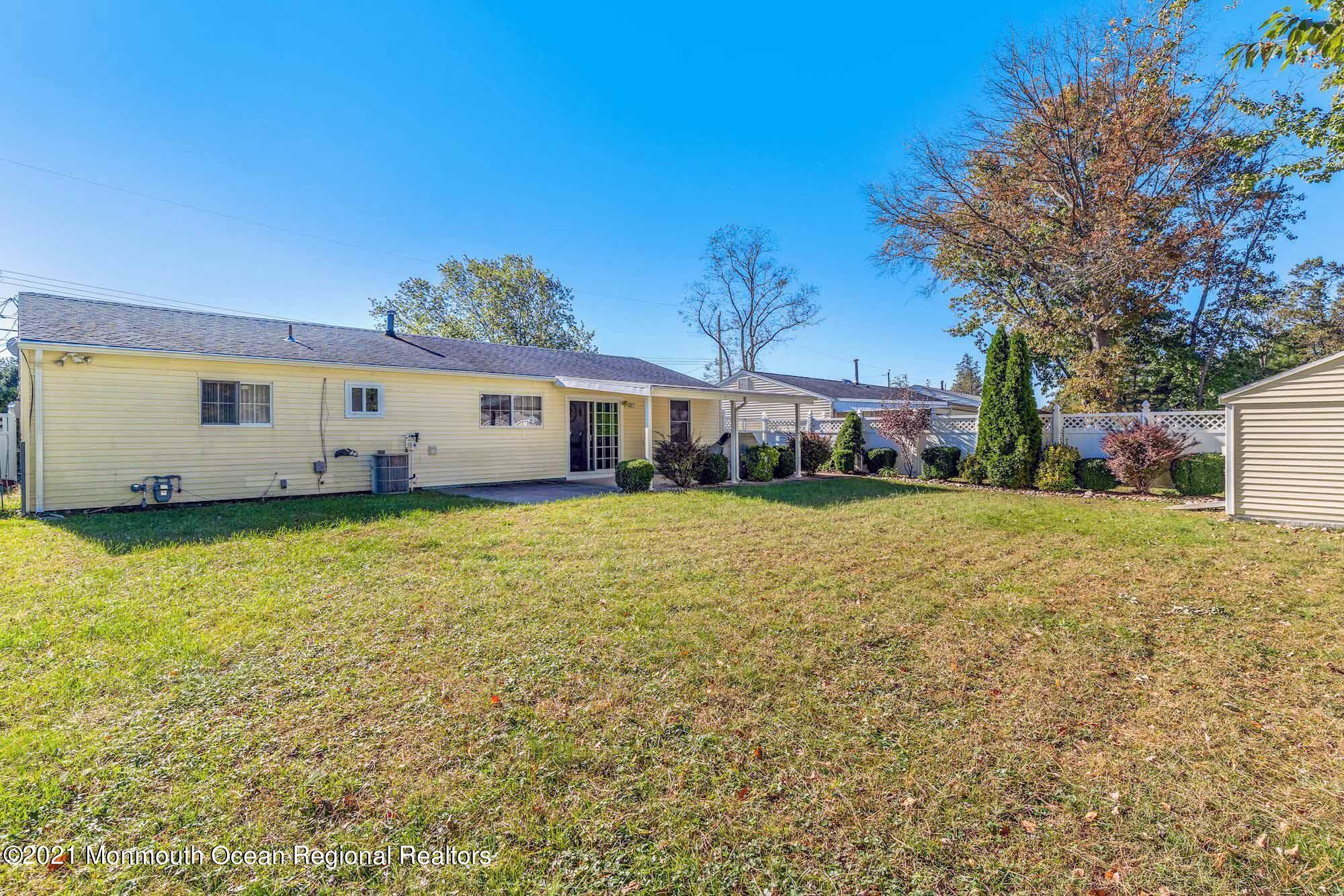 451 Alfred Road Toms River, NJ 08757 - Photo 24 of 25 a view of a house with a garden