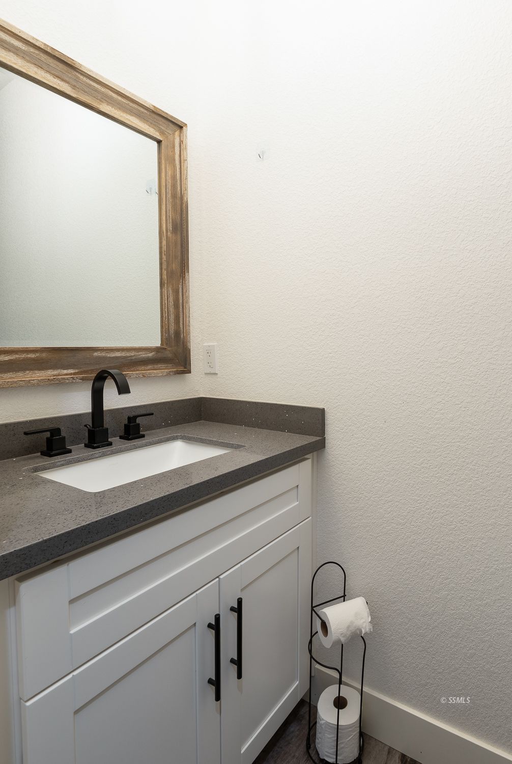 444 Jacks Ranch Road Ridgecrest, CA 93555 - Photo 36 of 48 a bathroom with a sink and a mirror