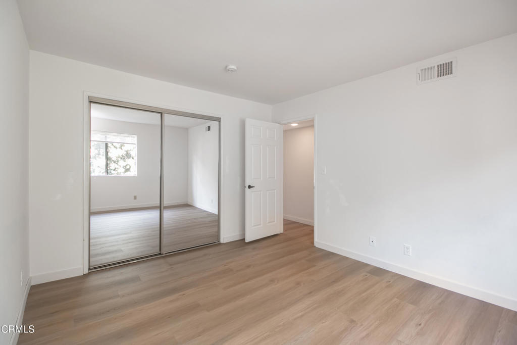 1169 Rosedale Avenue, Unit 208 Glendale, CA 91201 - Photo 11 of 20 a view of empty room with wooden floor