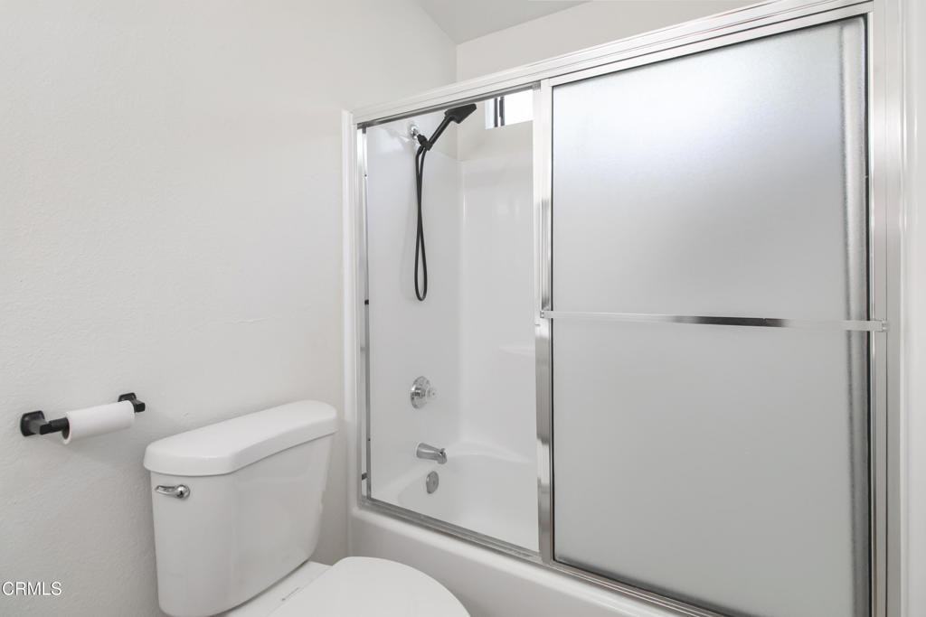 1169 Rosedale Avenue, Unit 208 Glendale, CA 91201 - Photo 13 of 20 a bathroom with a shower a toilet and a shower