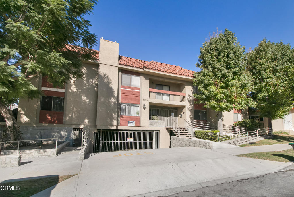1169 Rosedale Avenue, Unit 208 Glendale, CA 91201 - Photo 16 of 20 a view of a building with a tree