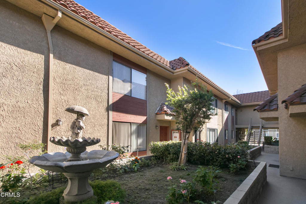 1169 Rosedale Avenue, Unit 208 Glendale, CA 91201 - Photo 19 of 20 a front view of a house with garden