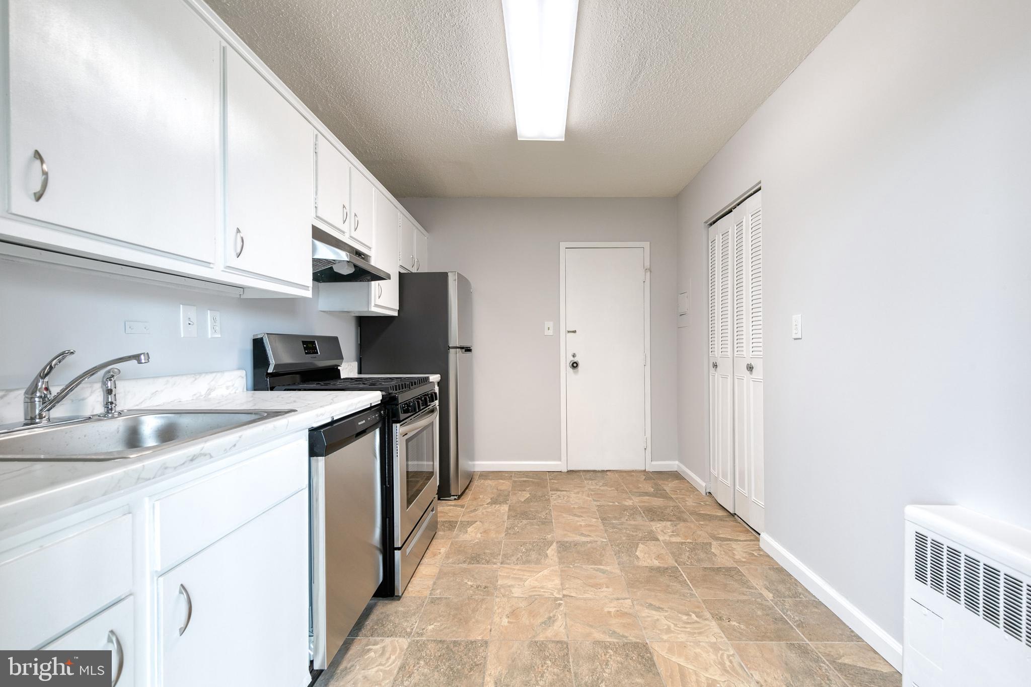 4401 Roland Avenue, Unit 408 Baltimore, MD 21210 - Photo 11 of 33 Updated Kitchen with All New Appliances