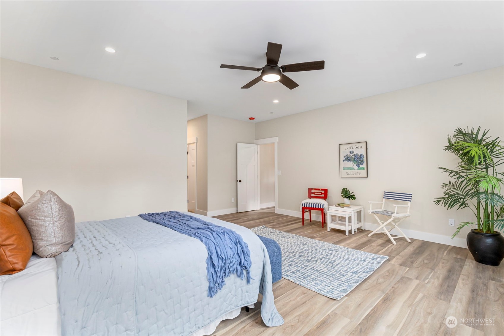 22086 Dewberry Road Northeast Indianola, WA 98342 - Photo 18 of 40 a bedroom with a bed and furniture