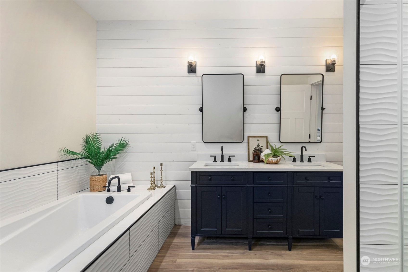 22086 Dewberry Road Northeast Indianola, WA 98342 - Photo 20 of 40 a bathroom with a tub sink and mirror