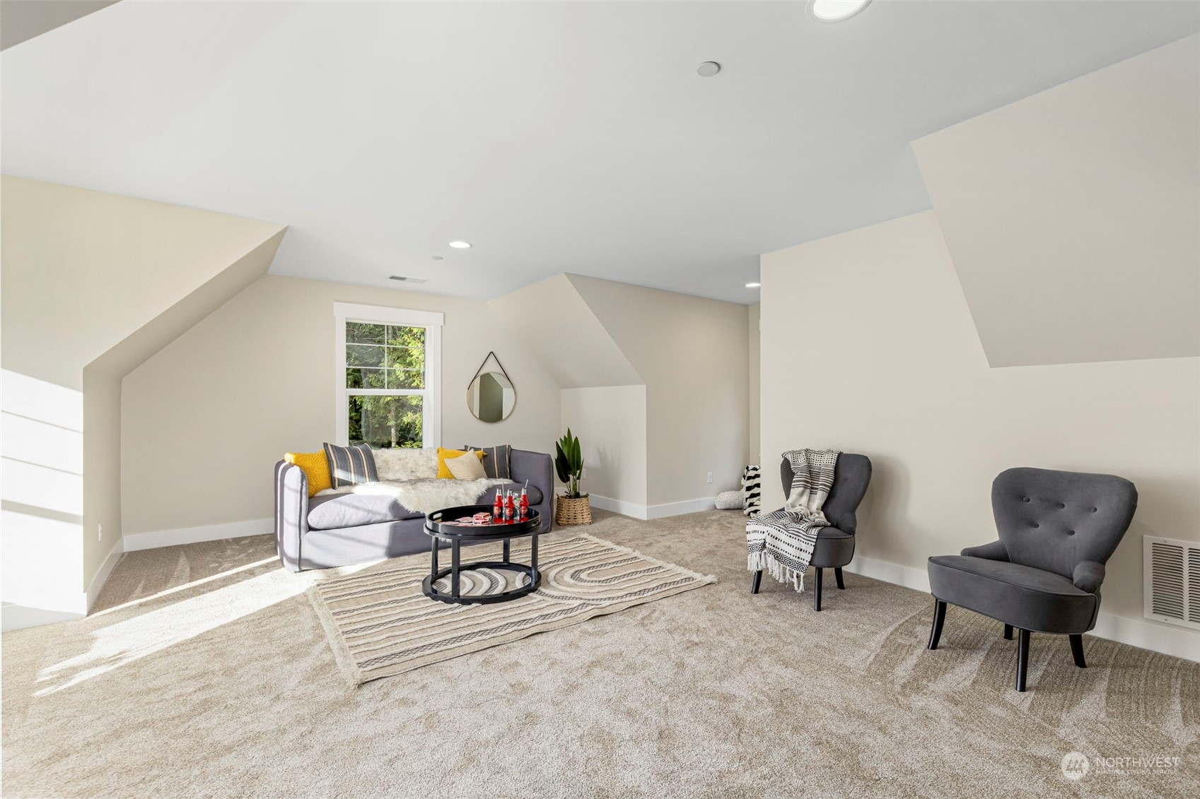22086 Dewberry Road Northeast Indianola, WA 98342 - Photo 26 of 40 a living room with furniture and a window