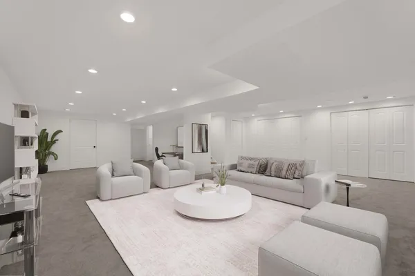 a living room with furniture and a table