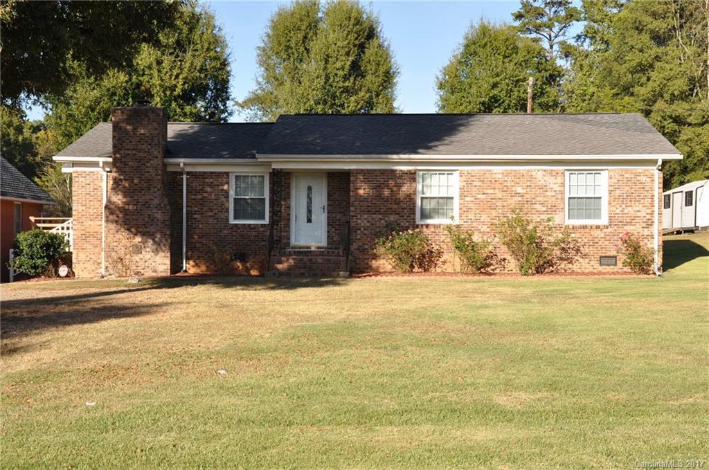 3801 White Store Road Wingate, NC 28174 - Photo 2 of 23 a front view of a house with garden