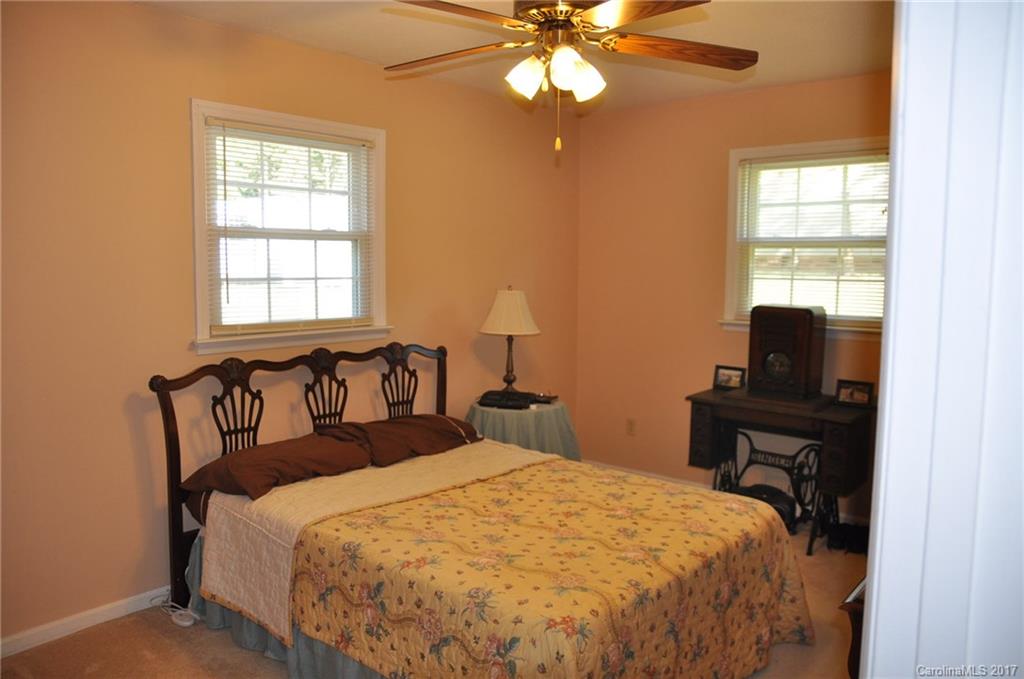 3801 White Store Road Wingate, NC 28174 - Photo 8 of 23 a bedroom with a bed and a window