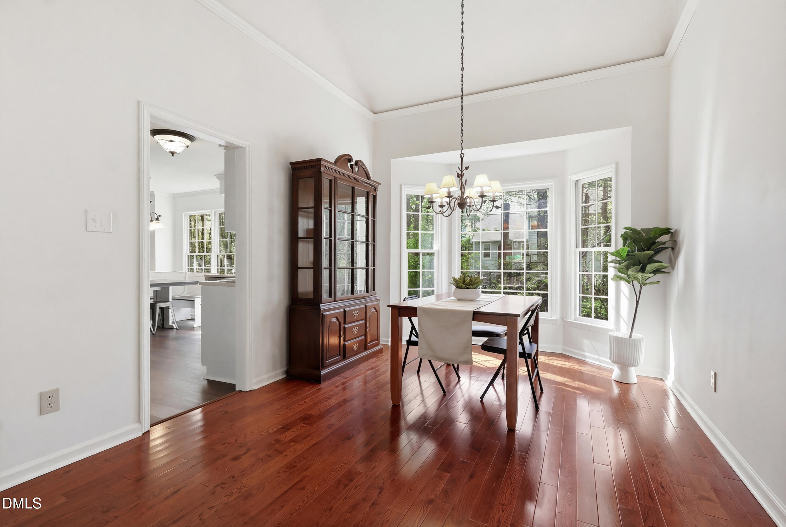107 Canyon Run Cary, NC 27513 - Photo 12 of 43 a view of a dining room with furniture window and wooden floor