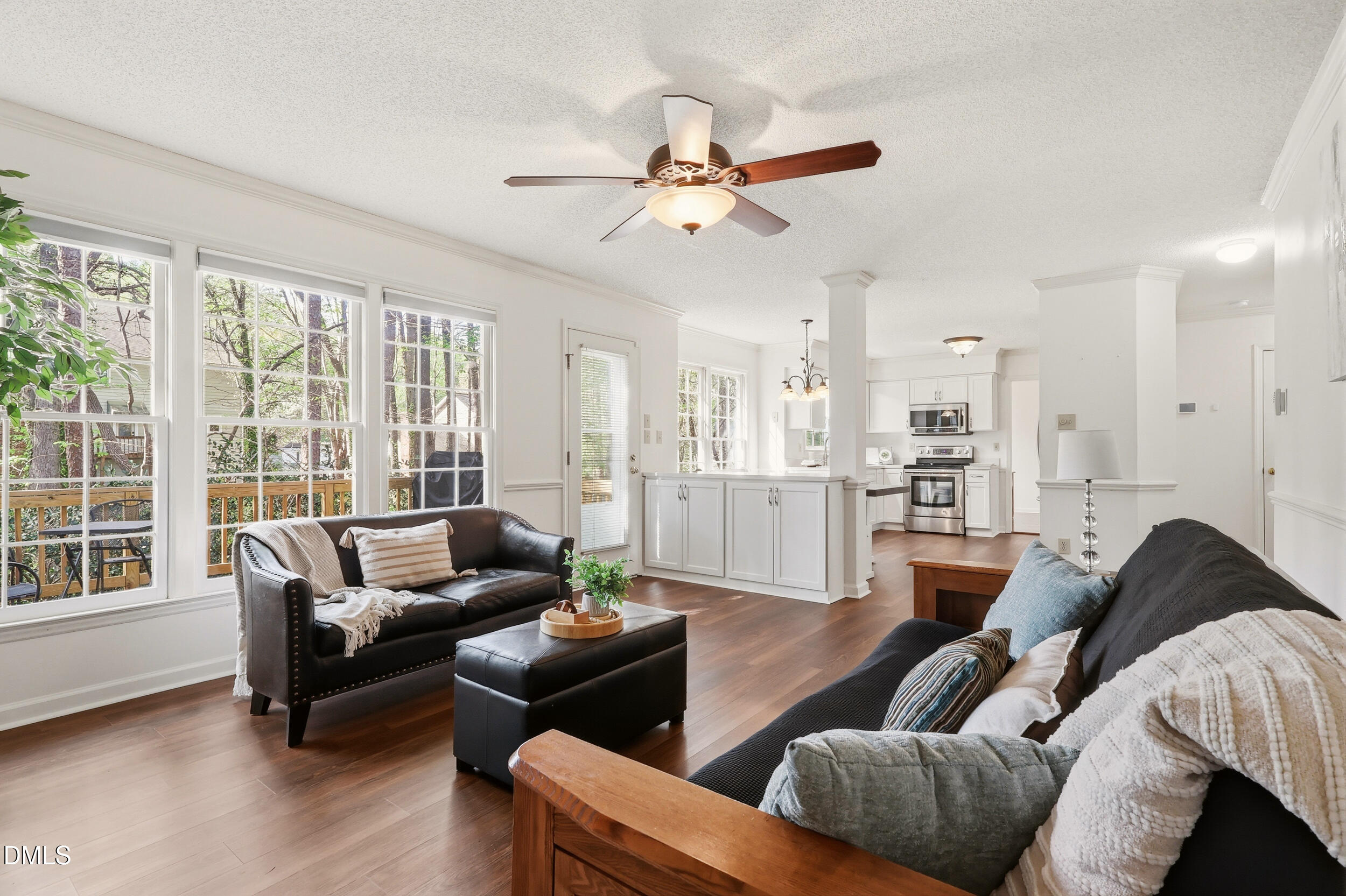 107 Canyon Run Cary, NC 27513 - Photo 20 of 43 a living room with furniture and a large window