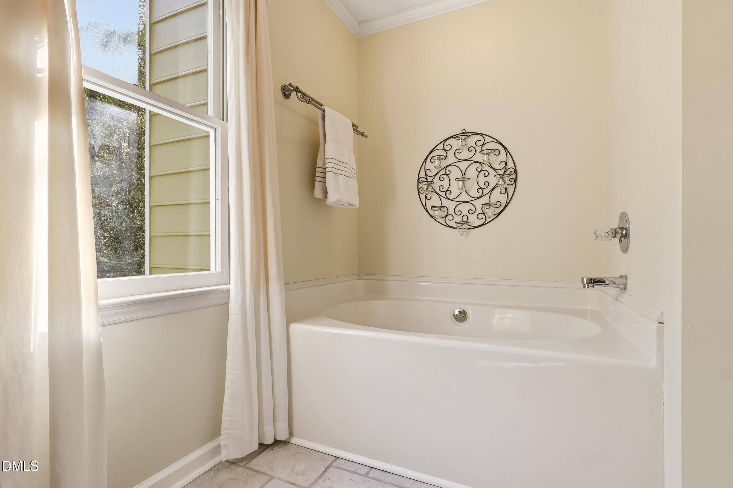 107 Canyon Run Cary, NC 27513 - Photo 29 of 43 a bathroom with a bathtub and a shower