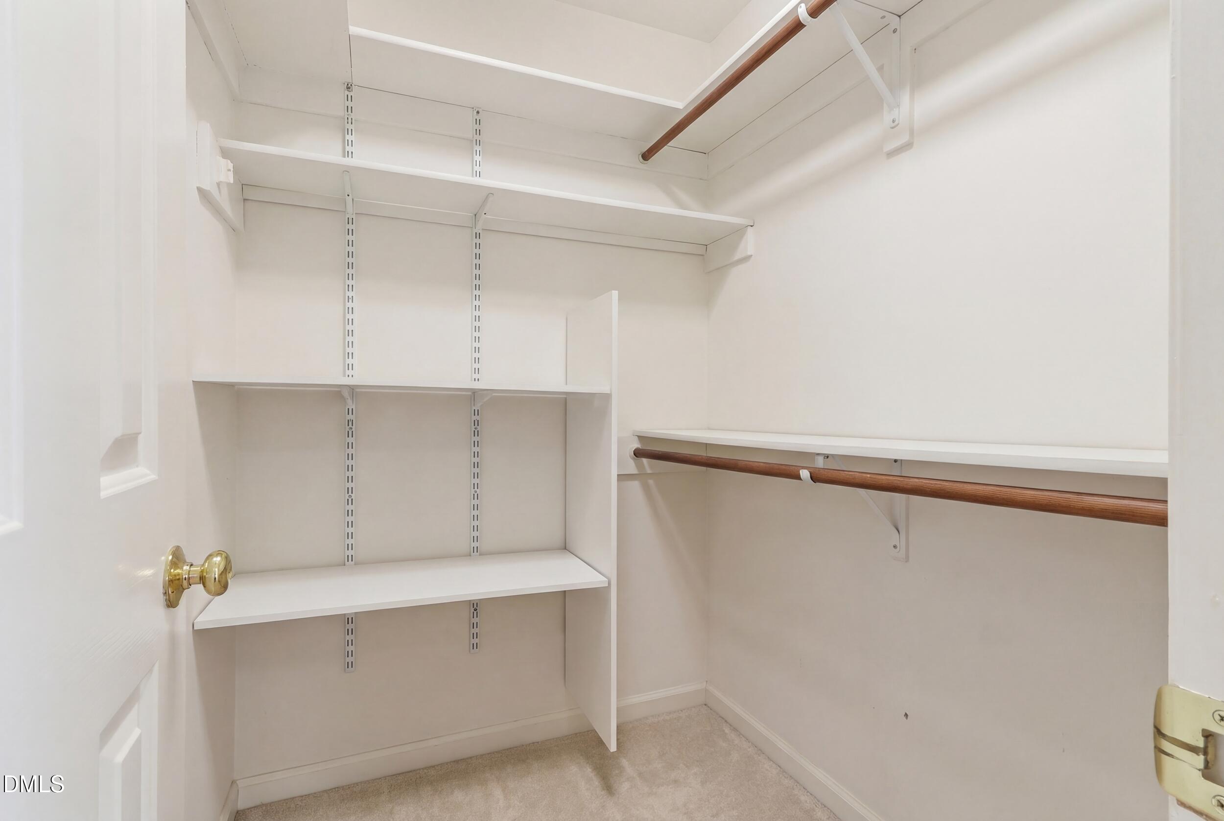 107 Canyon Run Cary, NC 27513 - Photo 31 of 43 a view of an empty walk in closet