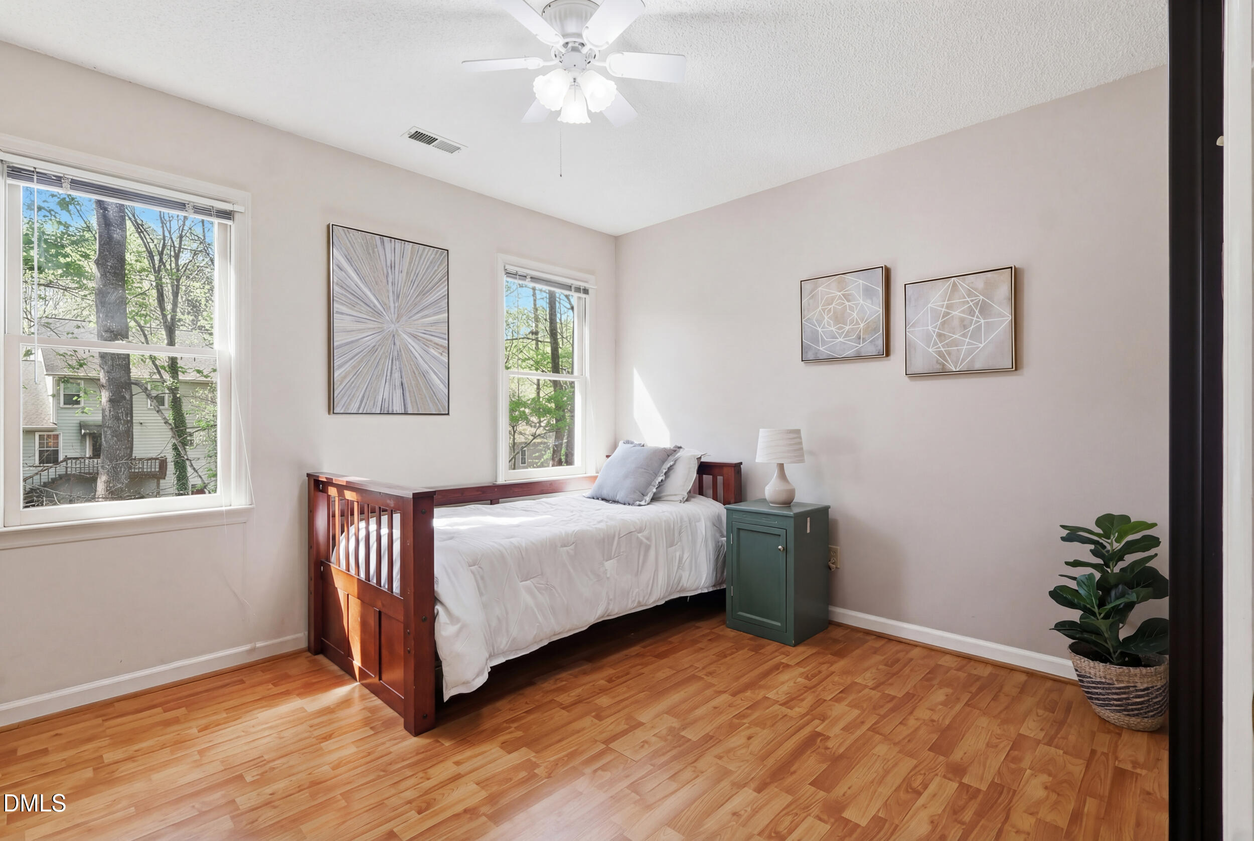 107 Canyon Run Cary, NC 27513 - Photo 35 of 43 a bedroom with a bed and a window