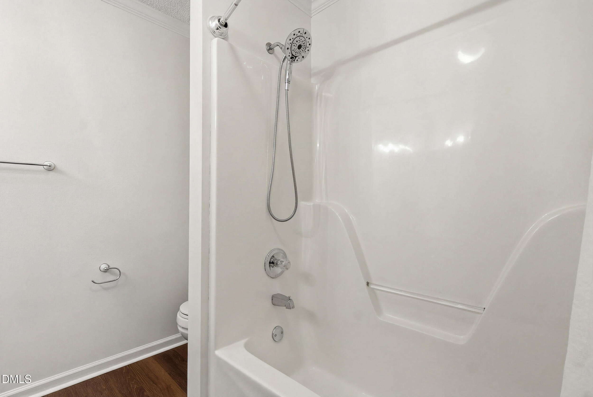 107 Canyon Run Cary, NC 27513 - Photo 38 of 43 a bathroom with a shower and a white bath tub