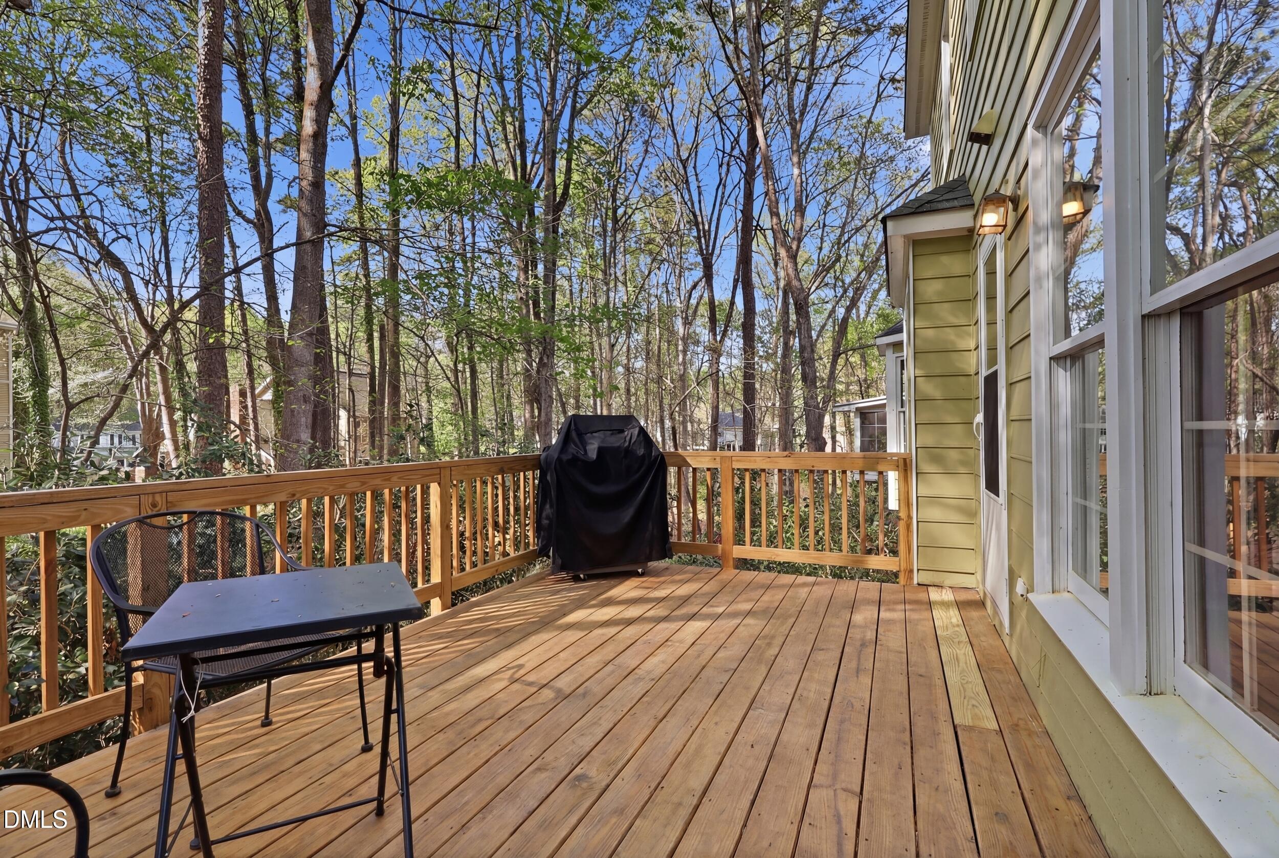107 Canyon Run Cary, NC 27513 - Photo 39 of 43 a view of a roof deck with wooden floor and outdoor seating
