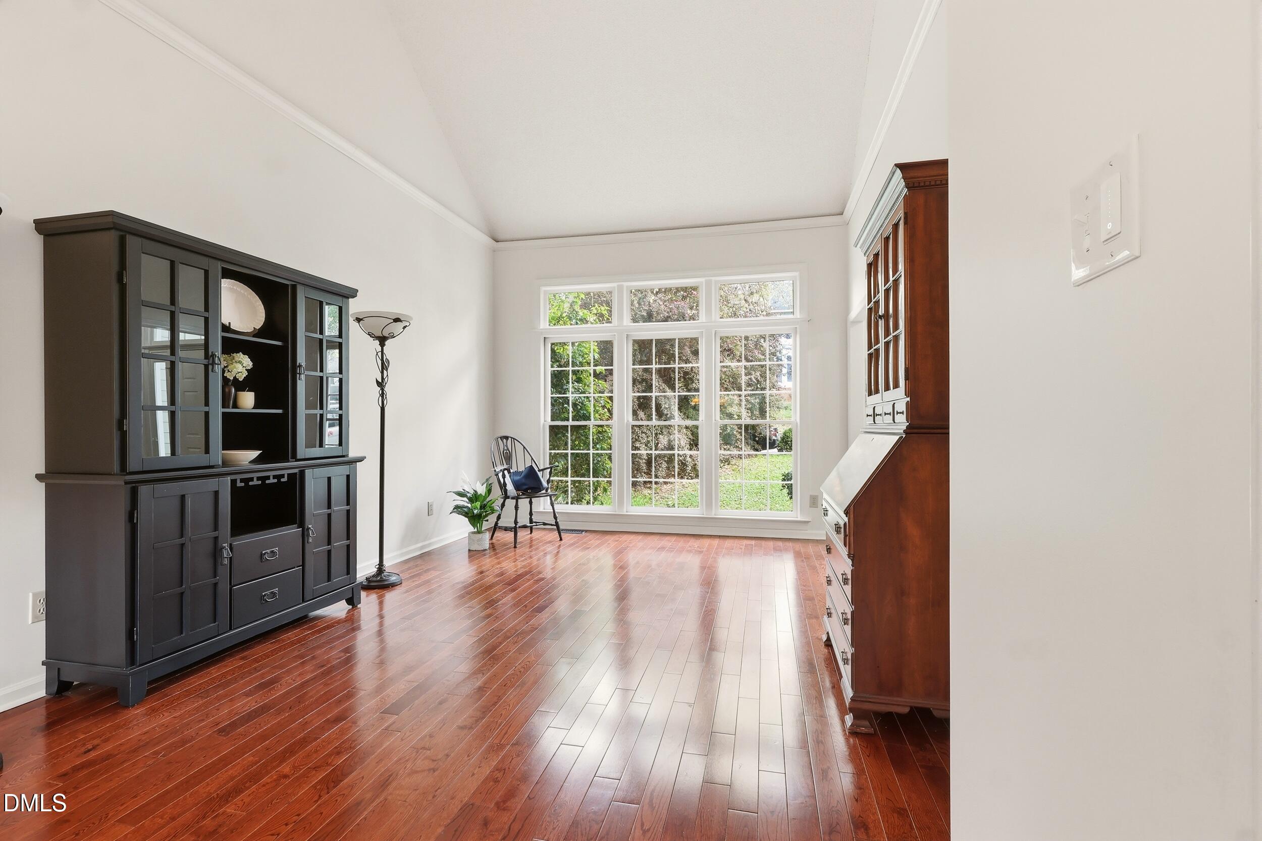 107 Canyon Run Cary, NC 27513 - Photo 7 of 43 wooden floor in an empty room with a window