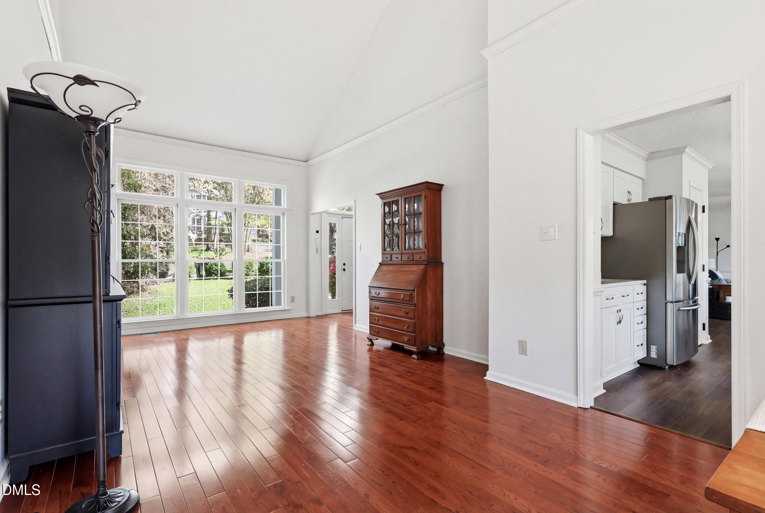 107 Canyon Run Cary, NC 27513 - Photo 8 of 43 a view of empty room with wooden floor and fan