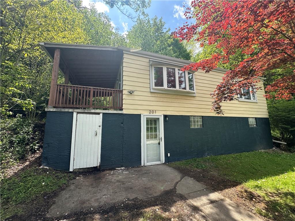 201 Clever Road McKees Rocks, PA 15136 - Photo 2 of 30 a view of a house with a yard